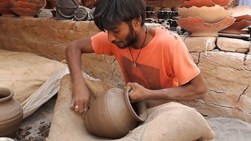 Midsection of man working