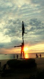 Scenic view of sea against cloudy sky