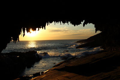 Scenic view of sea at sunset
