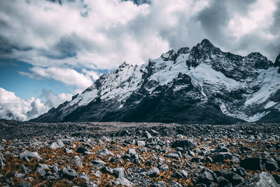 Scenic view of snowcapped mountains against sky