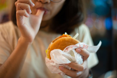 Close-up of woman holding ice cream