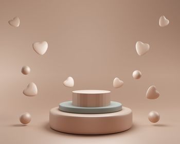 3d podium display background. beige with levitating hearts. beauty cosmetic product presentation. 