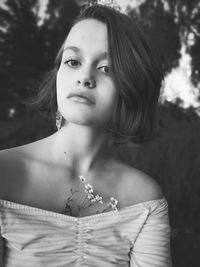 Portrait of young woman looking away