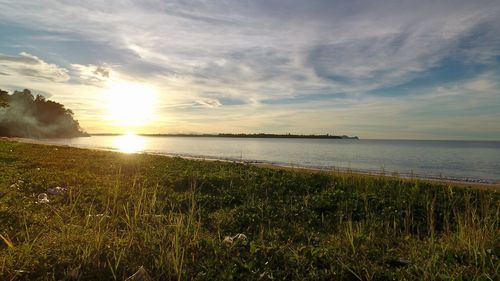 Scenic view of sea against sky during sunset