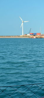 Scenic view of sea against blue sky and clouds
