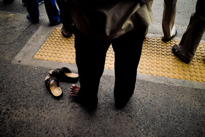 Low section of people standing