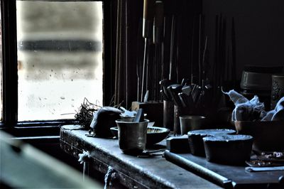 Containers on table in workshop