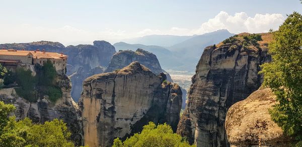 Panoramic view of rock formations against sky