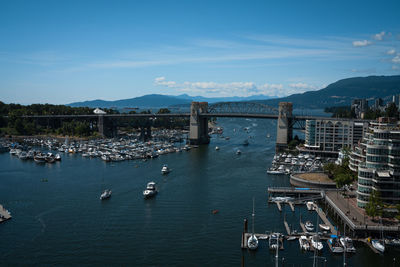 High angle view of bridge over bay against sky