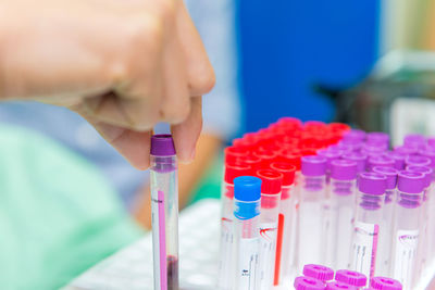 Close-up of hand test tube with medical sample