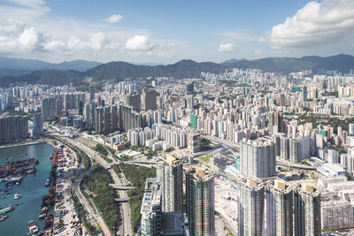 High angle shot of cityscape against sky