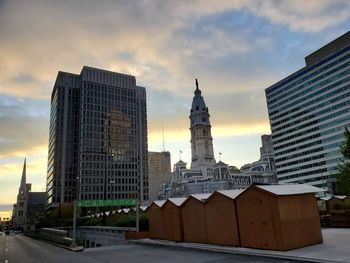 View of buildings against cloudy sky