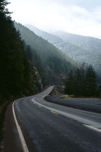 Scenic view of mountain road against sky