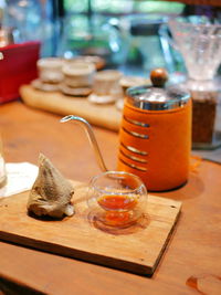 Close-up of drink in glass jar on table