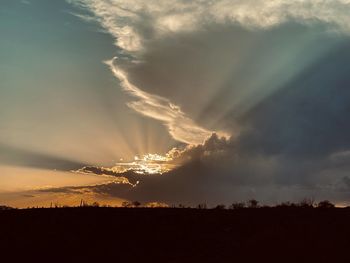 Scenic view of mountains against sky during sunset