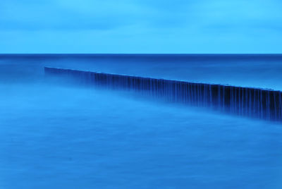 View of blue sea against clear sky