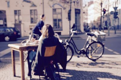 Woman standing on city street