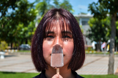 Portrait of teenage girl in city