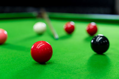 Close-up of red balls on table