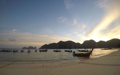 Panoramic view of beach against sky during sunset