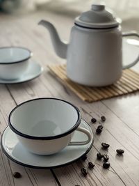 High angle view of coffee cup on table