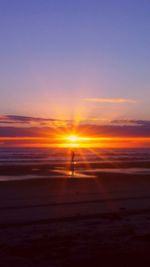 Scenic view of sea at sunset