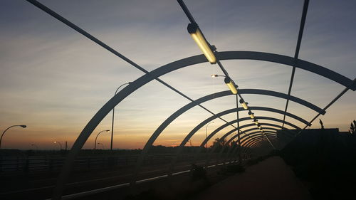 Silhouette of bridge against sky during sunset