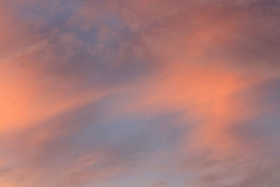 Low angle view of dramatic sky during sunset