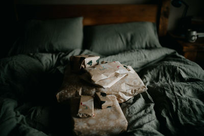 High angle view of human skull on bed at home