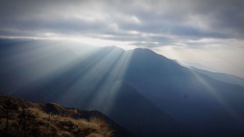 Scenic view of mountains against sky