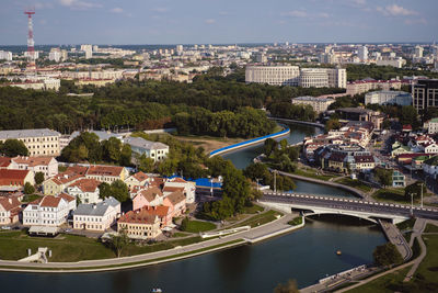 High angle view of river amidst buildings in city