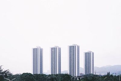 View of buildings against clear sky