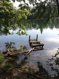 Boat in lake against sky