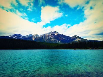 Scenic view of lake against blue sky