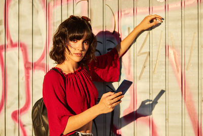 Young woman using mobile phone