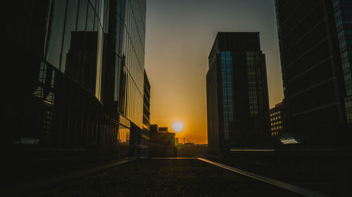 View of skyscrapers at sunset