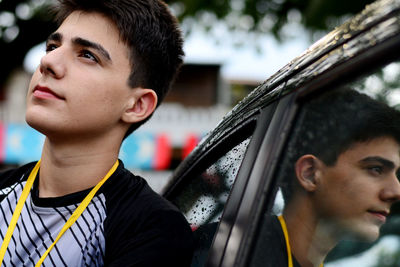 Portrait of young man looking away