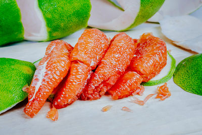 High angle view of fruits in plate on table