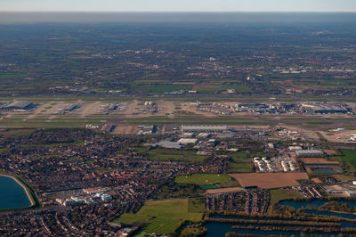 High angle view of city buildings against sky