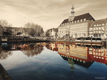 Reflection of buildings in river