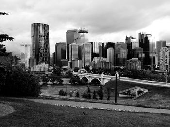 Modern buildings in city against sky