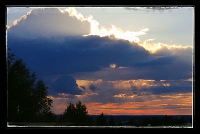 Scenic view of landscape against cloudy sky