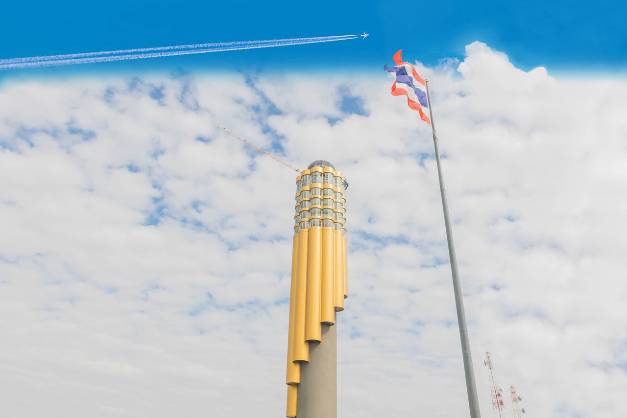 cloud, sky, flag, nature, blue, mast, day, low angle view, architecture, wind, no people, patriotism, tower, outdoors, built structure, environment, pole, travel