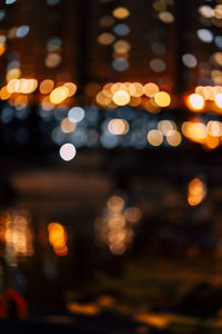 Defocused image of illuminated lights at night