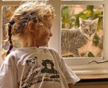 Portrait of girl with cat
