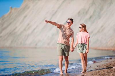 Friends enjoying on beach