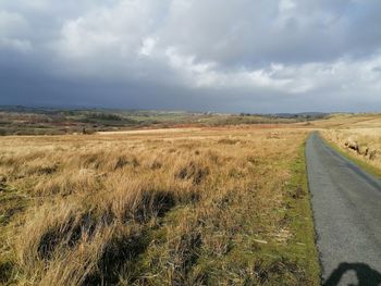 View of empty road along landscape