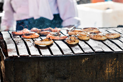 Close-up of meat on barbecue grill