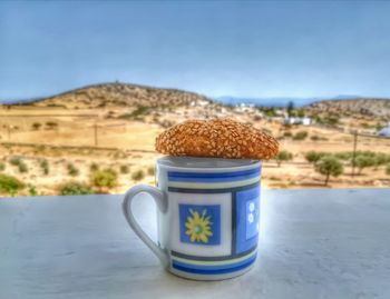 Close-up of coffee cup on table