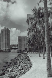 Buildings in city against sky